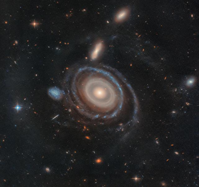 "Straight Shot: Hubble Investigates Galaxy with Nine Rings"

NASA Hubble Space Telescope, CC BY 2.0, via Wikimedia Commons or Flickr: https://flic.kr/p/2qJU36N