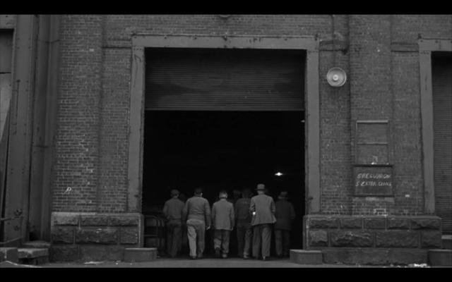 The last scene of On the Waterfront where the workers run into the arms of the boss 