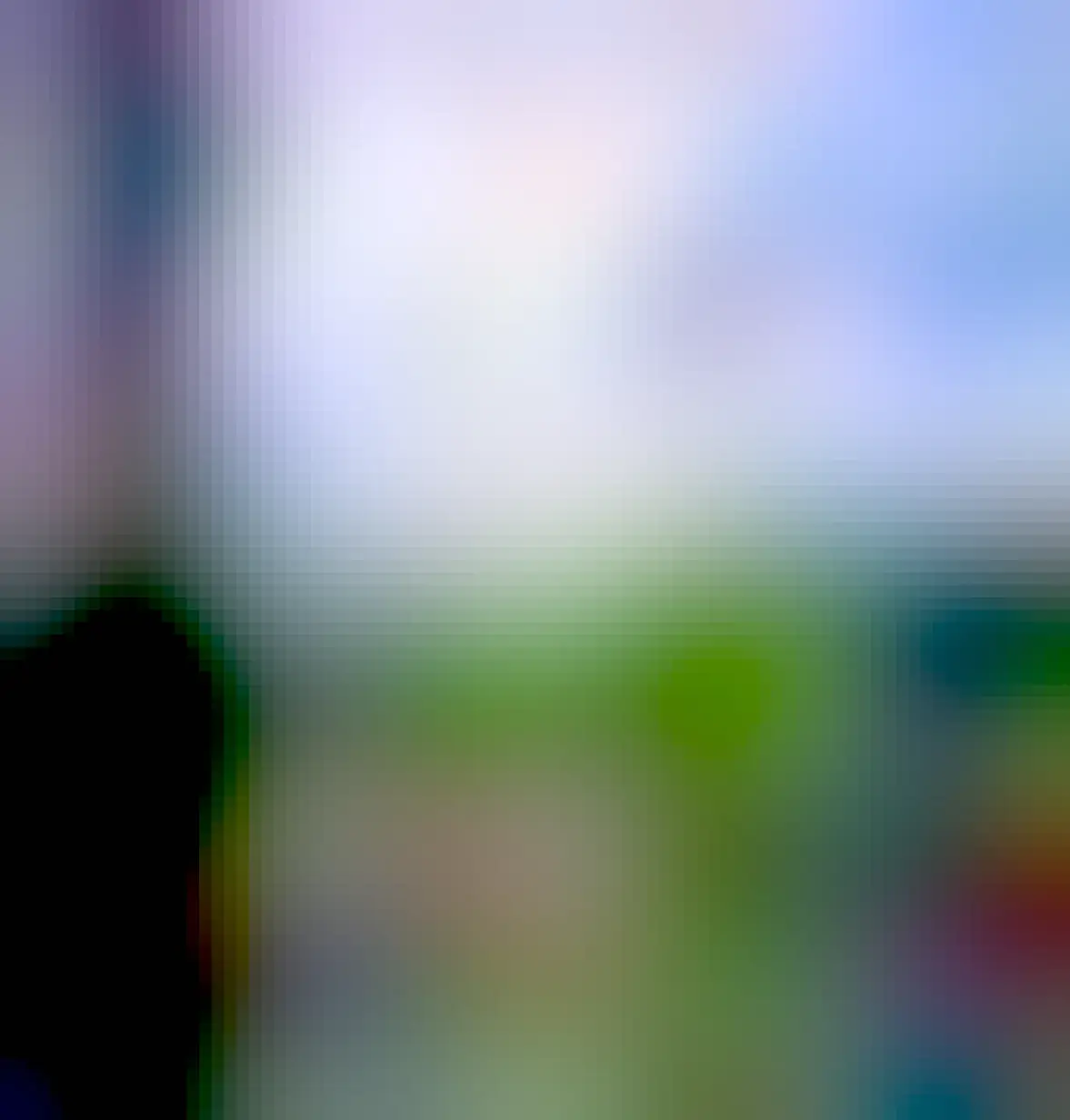 Screenshot of VoxeLibre with nice landscape, shot from stair sitting perspective.