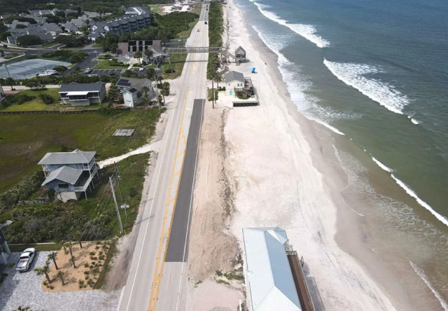 A stretch of beach with a large open patch, which is from the current house listing indicating that's what was for sale