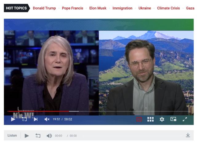 The poster with Amy Goodman on Democracy Now