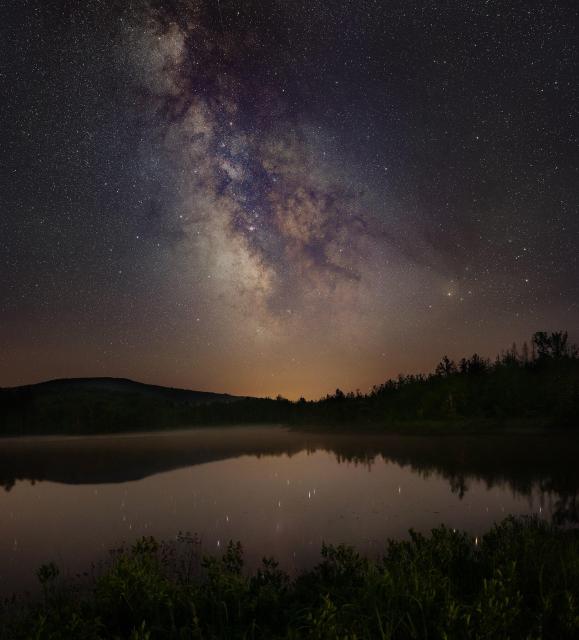 "The Milky Way over a local pond."

Nico Carver (NebulaPhotos.com), CC BY-SA 2.0, via Wikimedia Commons or Flickr: https://flic.kr/p/2rboF8u