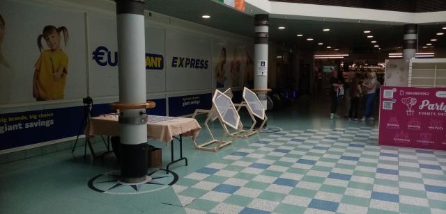 An art installation in a shopping centre photographed at a distance