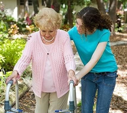 old lady being escorted by a young woman