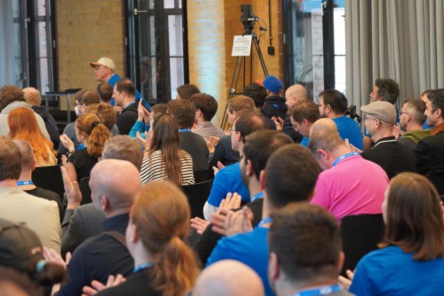 Picture from the crowd during one of the talks. You can see the back of their heads.