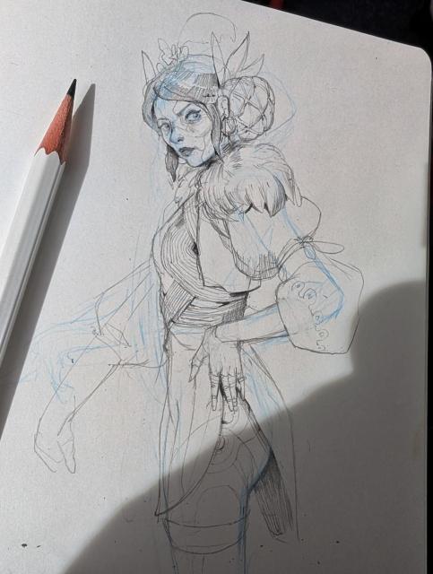 Photograph of a sketcbook page showing the character described in the post.