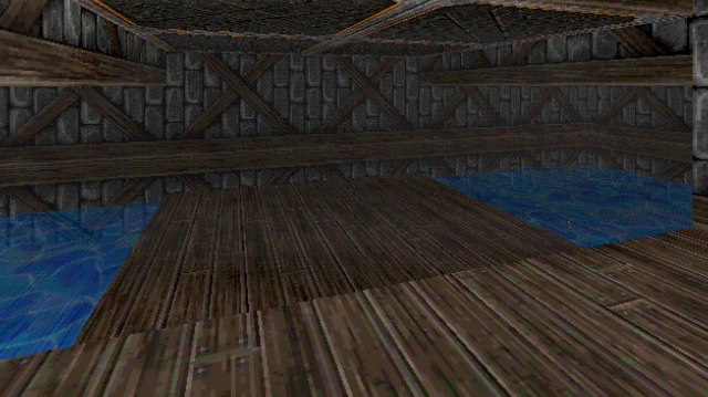 A scene rendered by a basic software renderer. An underground scene with wood reinforced brick walls and wood plank floors. The ceiling is vaulted, and the lower levels in front of the player are filled with water.