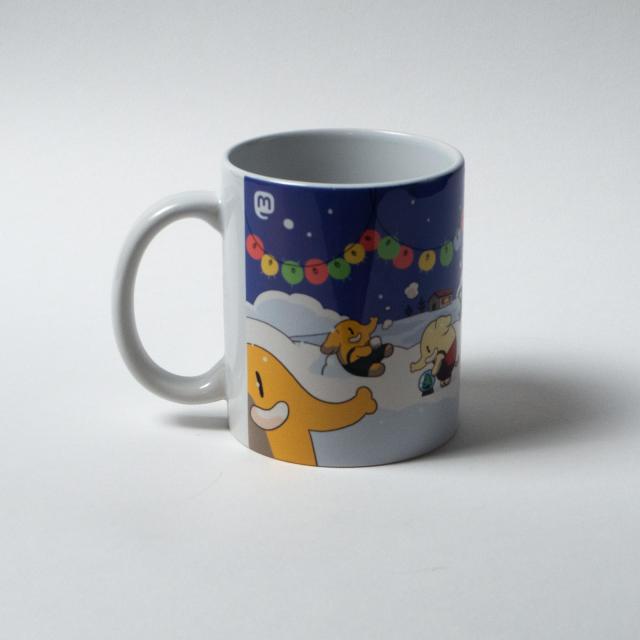 A ceramic mug with a comfortable handle featuring a festive winter-themed design with many Mastodons playing in the snow.