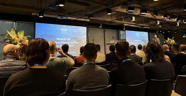Audience seated in front of the welcome screens at Nextcloud Enterprise Day in The Hague.