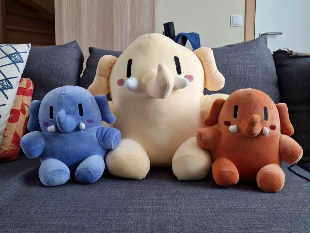 A family of plushtodons, Mr T the bigger beige version, has been joined by Mr Angel the small blue version and Mr Devil the orange version. 