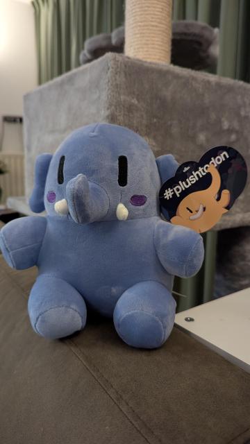 A small Mastodon plushie in blue