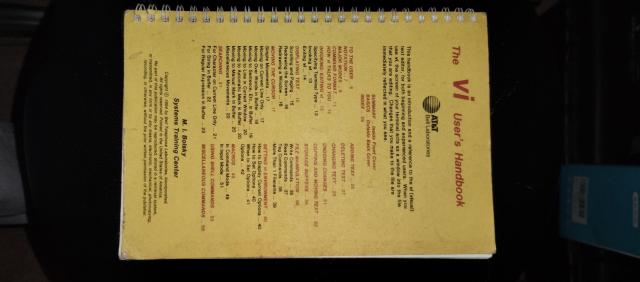 The cover to the VI User's Handbook ~AT&T - Bell Laboratories 

Text:
This handbook is an introduction and a reference to the vi (visual) text editor, for both beginning and experienced users: When you use vi the screen of your terminal acts as a window into the file that you are editing. Changes that you make to the file are immediately reflected in what you see. 
 ...

M. I. Bo/sky Systems Training Center 

Copyright© 1984 by Bell Telephone Laboratories. Incorporated. All rights reserved. Printed in the United States of America. No part of this publication may be reproduced, stored in a retrieval system. or transmitted, in any form, or by any means, electronic. mechanical, photocopying, recording, or otherwise, without the prior written permission of the publisher. 