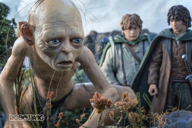 Gollum walks Sam and Frodo through the Dead Marshes, they look down at the ground. Sam looks at Gollum very suspiciously 