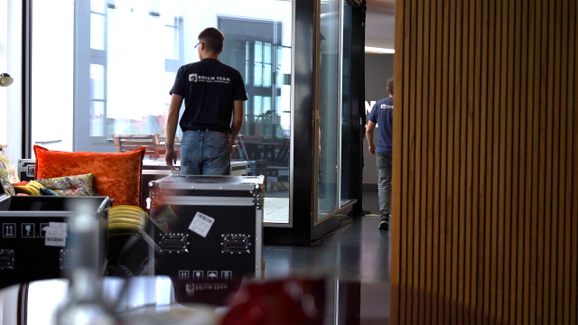 Backstage photo: team setting up the filming