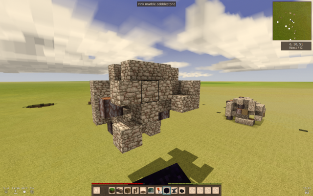 a random, shapeless assortment of cobblestone and wood blocks