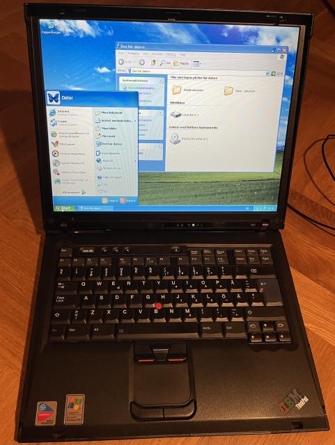An old IBM ThinkPad running Windows XP