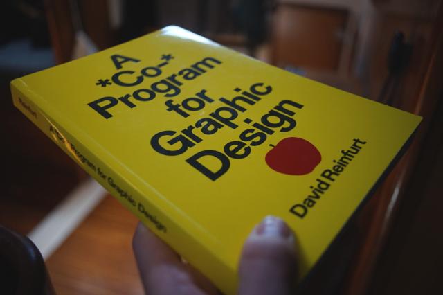 A copy of the yellow book, with an apple on it. It's about education I think.
