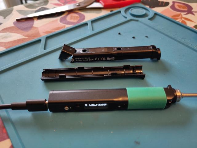 A Pinecil soldering iron with a brand new shell.
An old broken one is visible in the back.