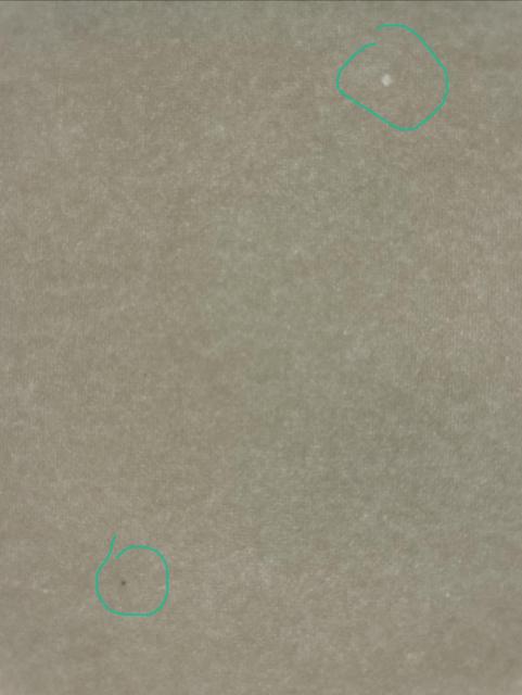 imperfections in arches watercolor paper, circled