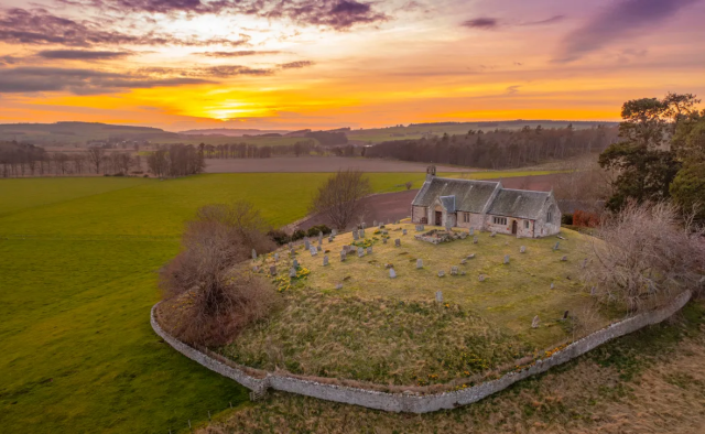 Linton Kirk in the Scottish Boarders (just), seen against the setting sun. Photograph Phil Wilkinson