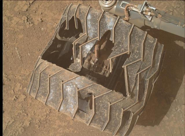 An heavily worn out wheel of the Mars rover Curiosity.