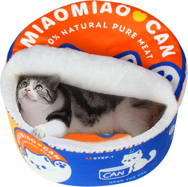 Cat bed shaped like a ramen cup with the words zero percent natural pure meat written on the lid