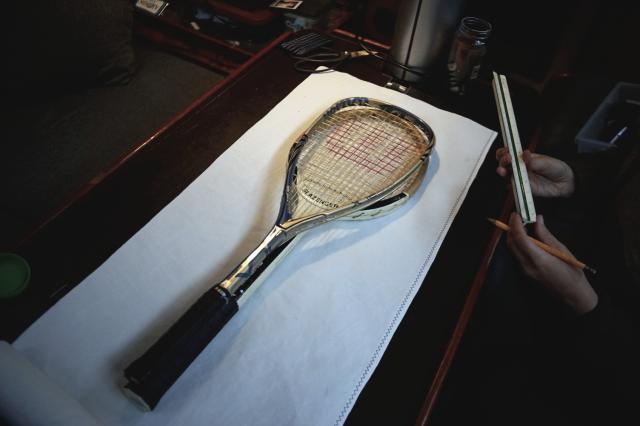 Drawing the template on dacron fabric.