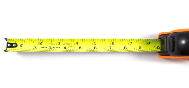 A tape measure that has inches marked out, but also "decimal feet"; that is, tenths of a foot, marked as .1, .2, .3, etc.