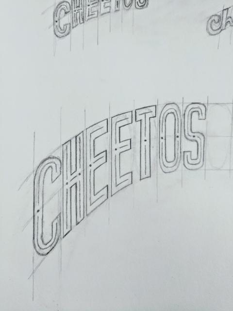 Sketch of the word "Cheetos" along an arch