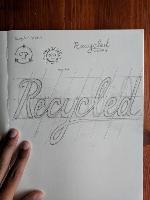 Sketch of the word Recycled.
