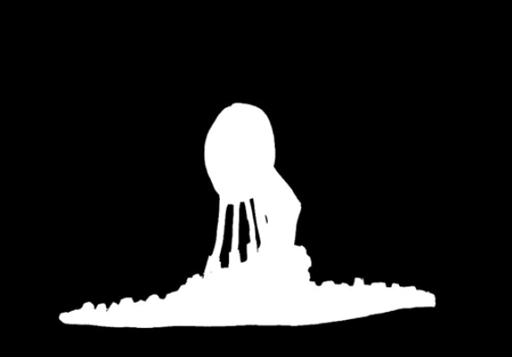 A white shape against a black background. It's a silhouette... but of what? A round shape extends pipe-like protrusions to a low pile of something bumpy.