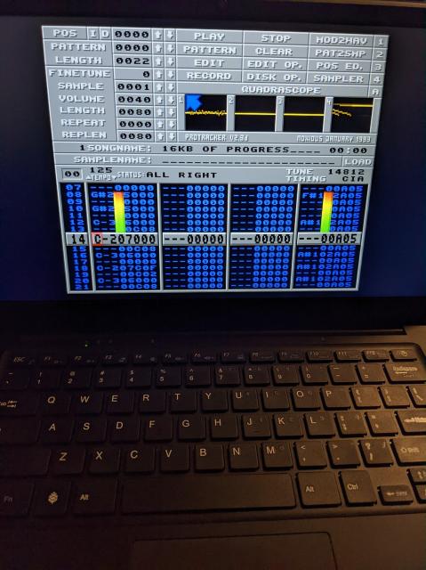 Photograph of PineBook Pro running pt2-clone.
