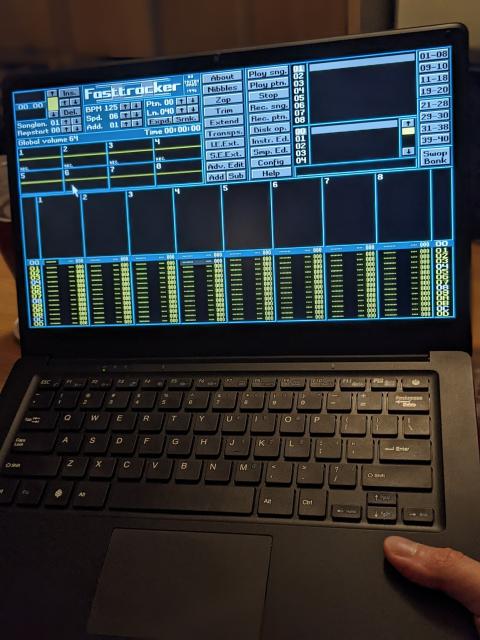 Photograph of PineBook Pro running ft2-clone.