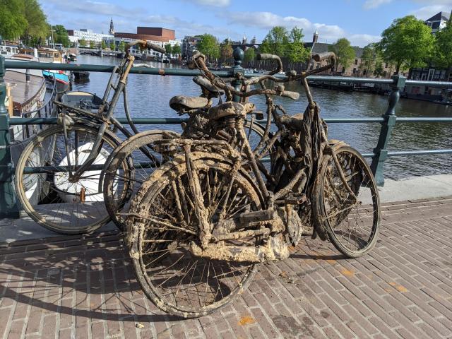 Mud covered bikes fished out of the Amstel river