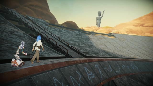 From Heaven's Vault: the main character and her robot companion walking along the rim of a structure covered in large Ancient writing. In the background is a large statue.