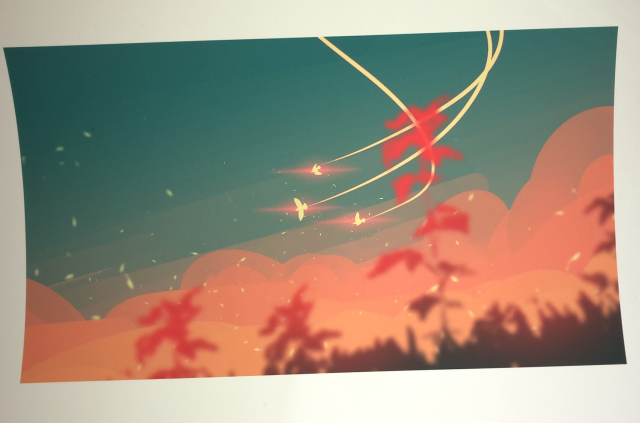A photograph of a print
Its a digital art of flying glowing birds with trails, above the orange clouds, and underneath the blue sky. There are some plants in the foreground