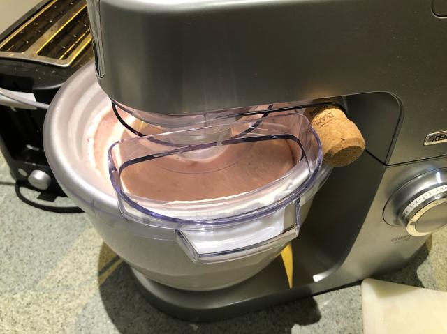 Cream, sugar and strawberries blended together and added to the ice-cream attachment on the Kenwood Chef countertop mixer. 