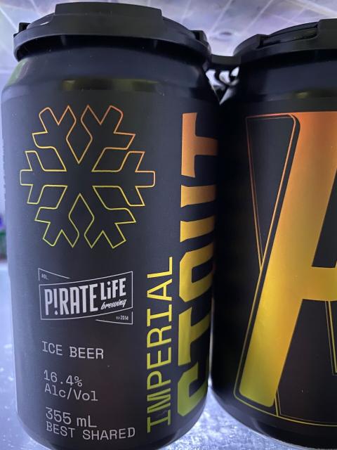 Black cans with goldish branding, and white logo. 355ml beer cans of Imperial Stout by the Pirate Life Brewery.
16.4% alcohol.