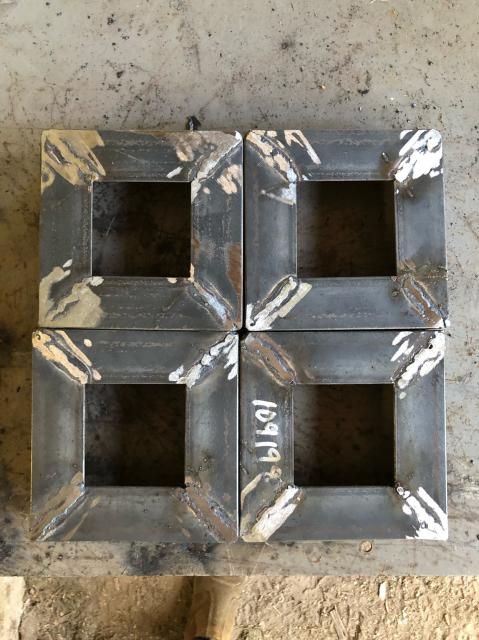 Four square column end caps, each welded from four pieces of 40x40x3mm angle steel