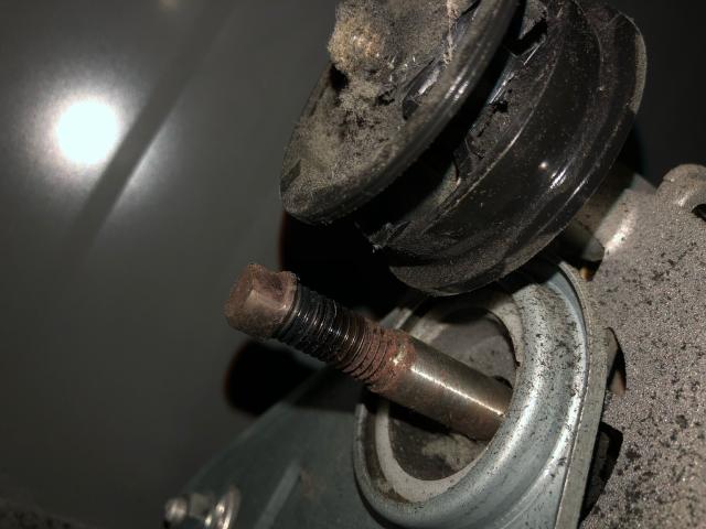 Clothes dryer motor and idler pulley. 