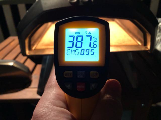 Digital IR thermometer showing 387°C