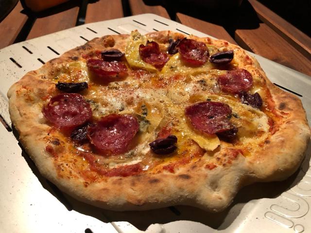 Finished pizza on the peel