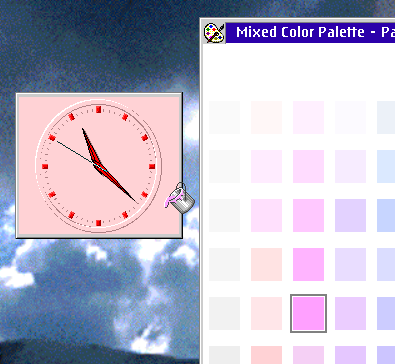 You can drag and drop colors and themes to apps to change how they look like, such as the clock