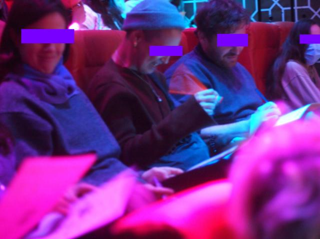 Closeup of anonymised audience (using state of the art AI LURK tech). This particular bunch reacted a bit too enthusiastically when the "What's the pad URL" prompt came up. Just saying...