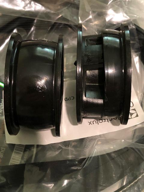 New idler pulley on the left, old one on the right showing part broken away and worn. 