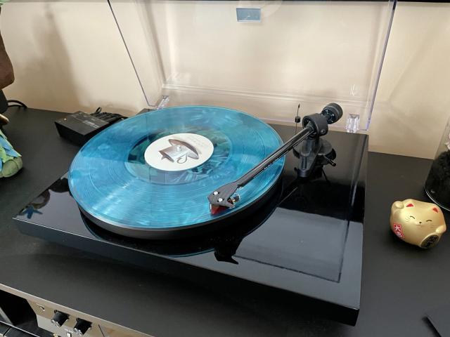 Devin Townsend’s Lightwork LP (transparent blue) in record player