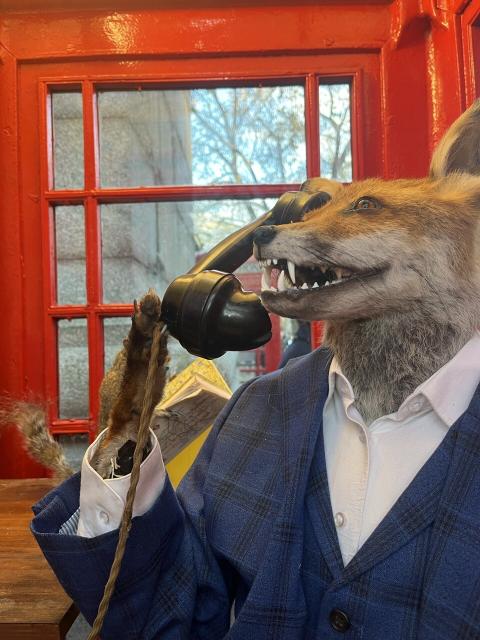 Art installation of a stuffed fox using a phonebooth in London 