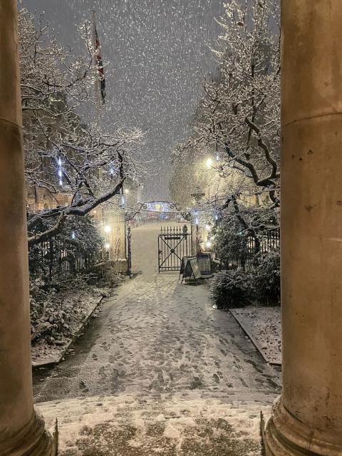A photo of a snowy scene in London, taken from the steps of St Mary Le Strand by Kestral Gaian on 11th December 2022.