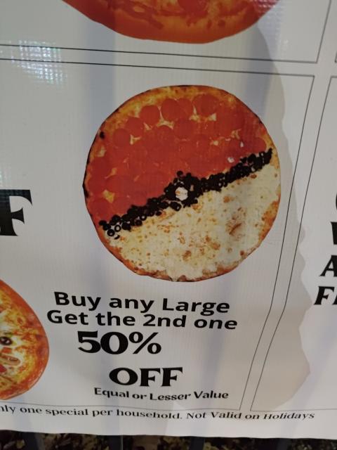 A picture of a pizza that looks like a PokeBall