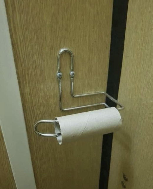 Clippy, at their new job as a toilet roll holder. 